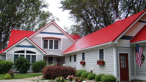 red house with siding and metal roof|red roof exterior house ideas.